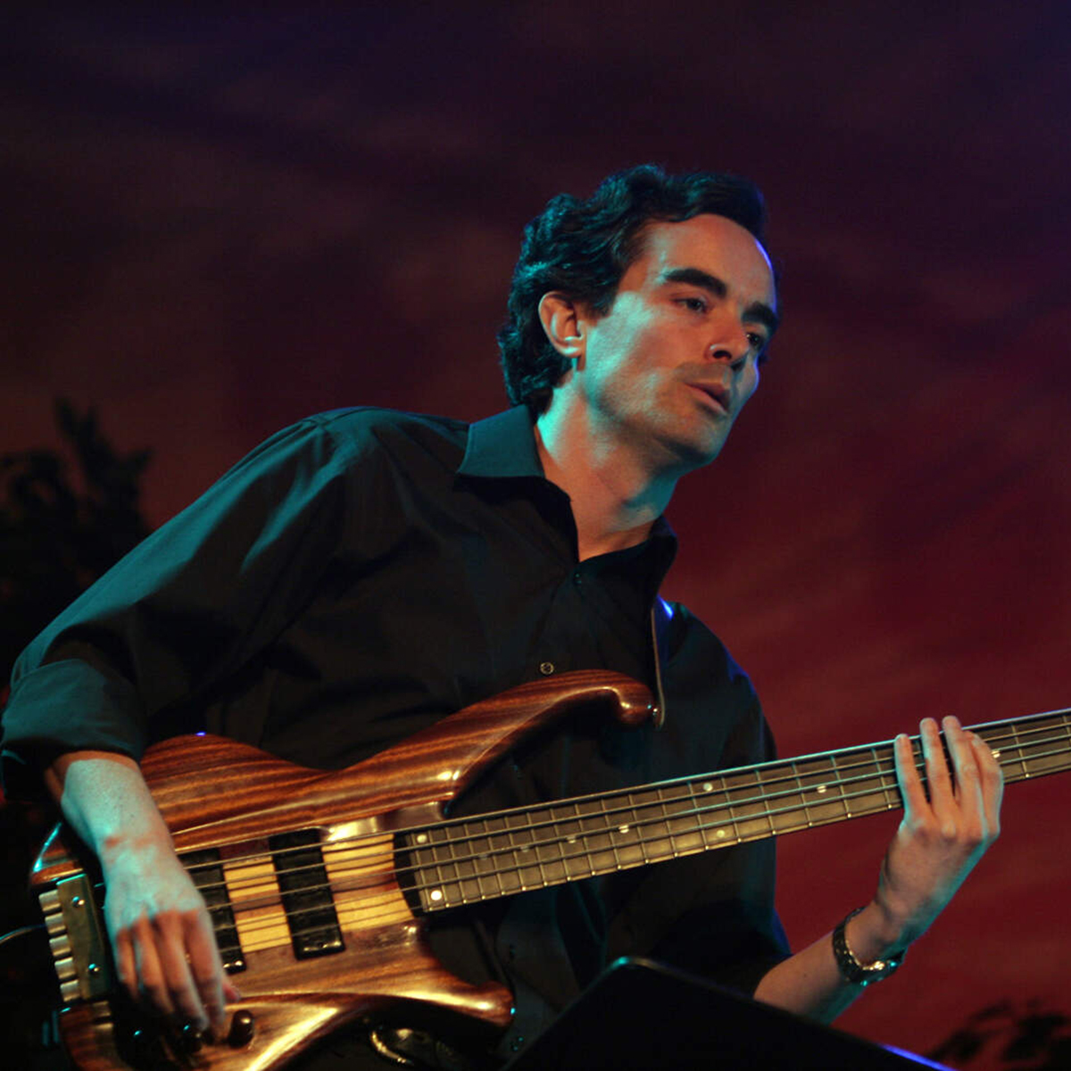 Photo of Fernando Huergo playing electric bass guitar